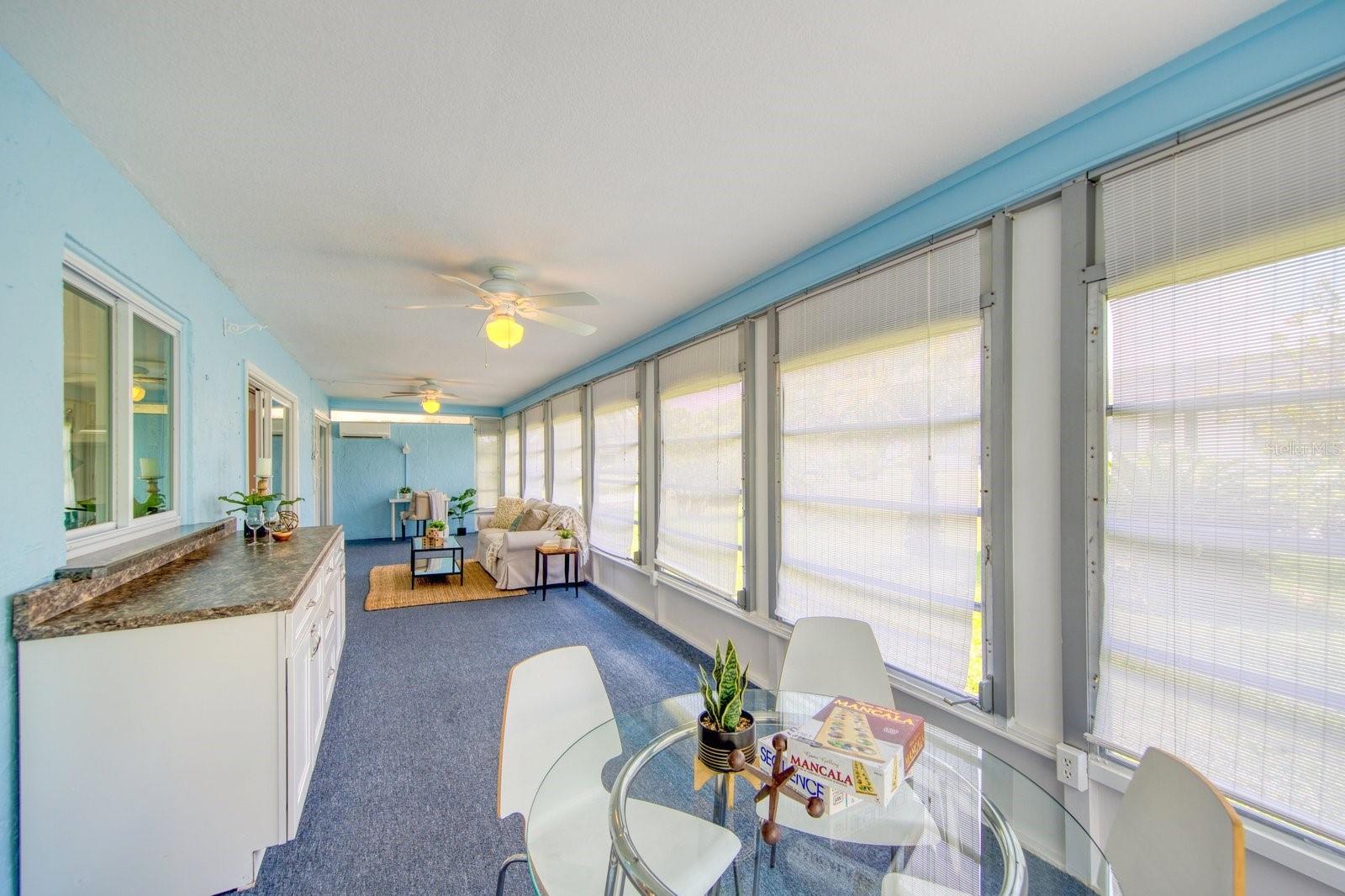 Finished Florida room with ceiling fans &amp; a mini split heating &amp; cooling system~