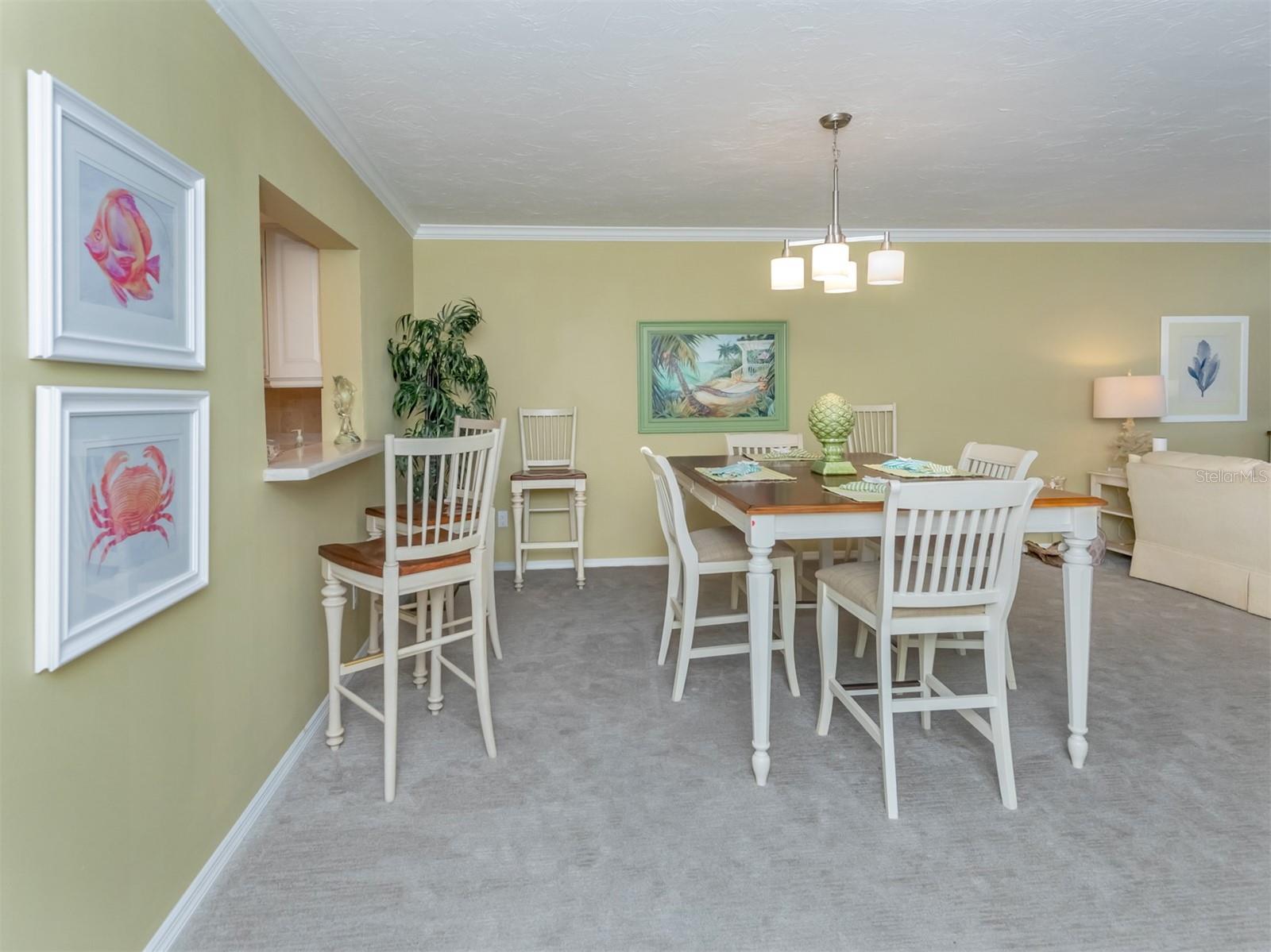 Dining Room With Convenient Pass Through to the Kitchen