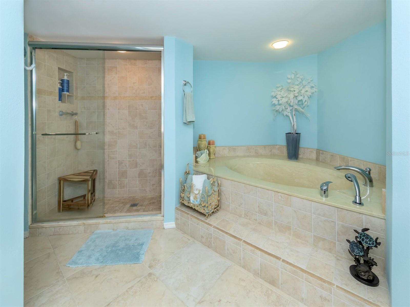 Master Bath Showing Soaking Tub and Beautiful Tiled Walkin  Shower