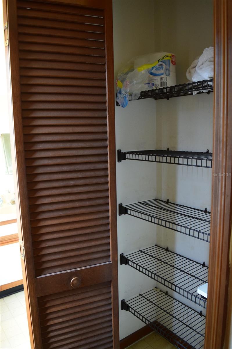 Linen closet inside ensuite bath