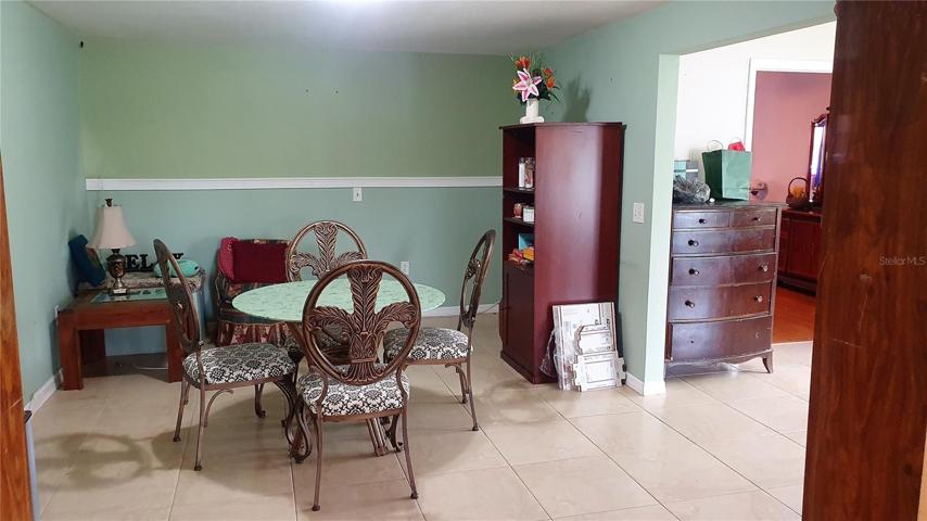 The large formal dining room can accommodate a full dining set with buffet and china hutch with room to spare