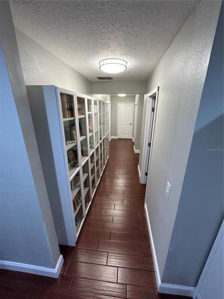 Hall to Media Room, Laundry and Garage