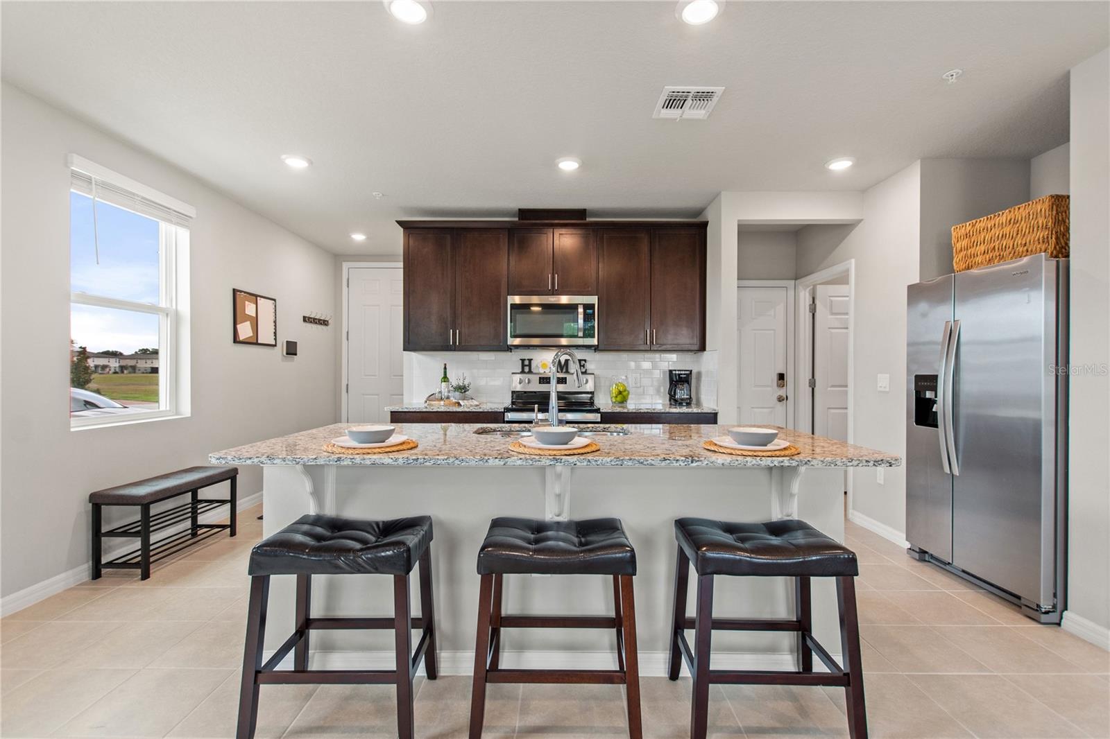 Stainless steel appliances and granite counters