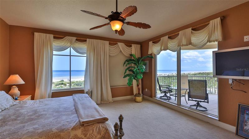 Huge Master bedroom opens to oceanfront balcony.