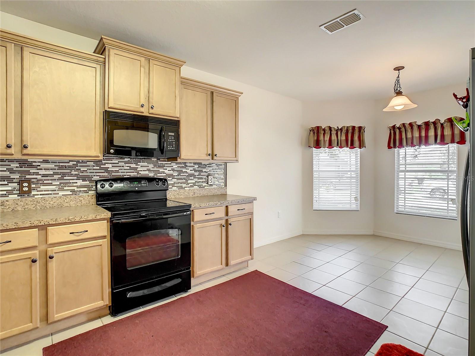 View of Kitchen from Pass Through/Breakfast Bar