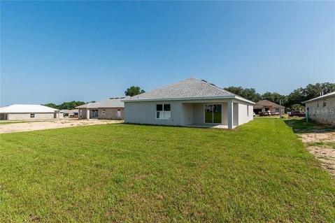 Generous back yard and covered lanai