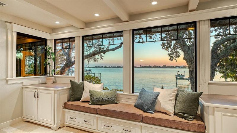 Family room window frames stunning sunsets over Casey Key.
