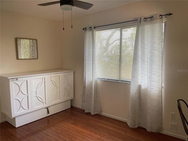 Bedroom 4 has a murphy bed.