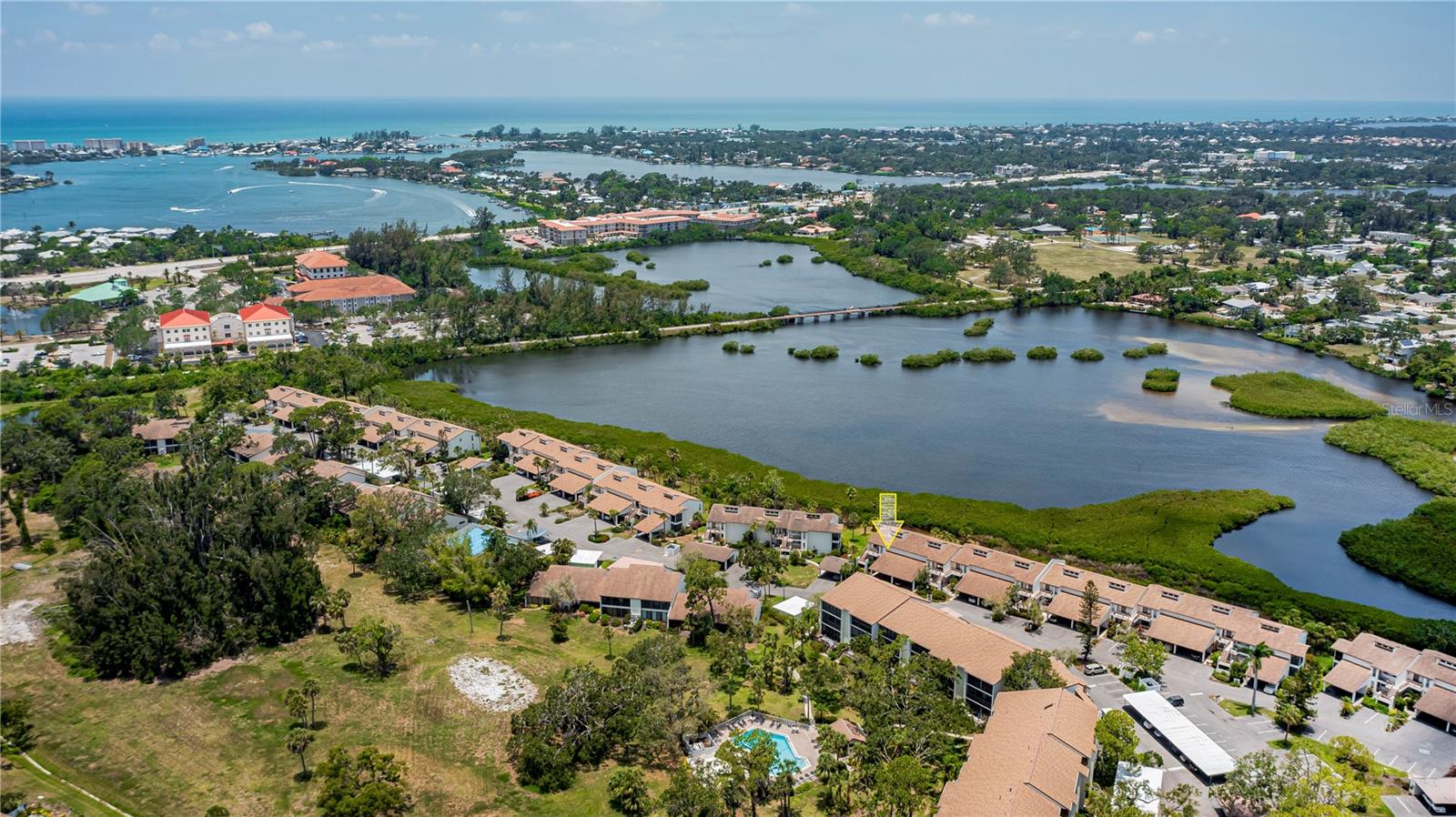 aerial photo of view, unit location shown with arrow
