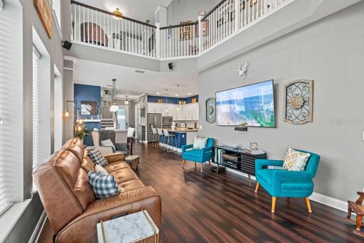Living room and a view of the railing on the 2nd floor.