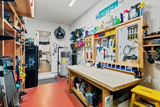 Garage with air conditioning and even a sink. Perfect for projects year round.
