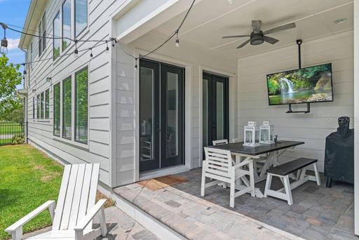 Lanai with fans and outdoor TV.