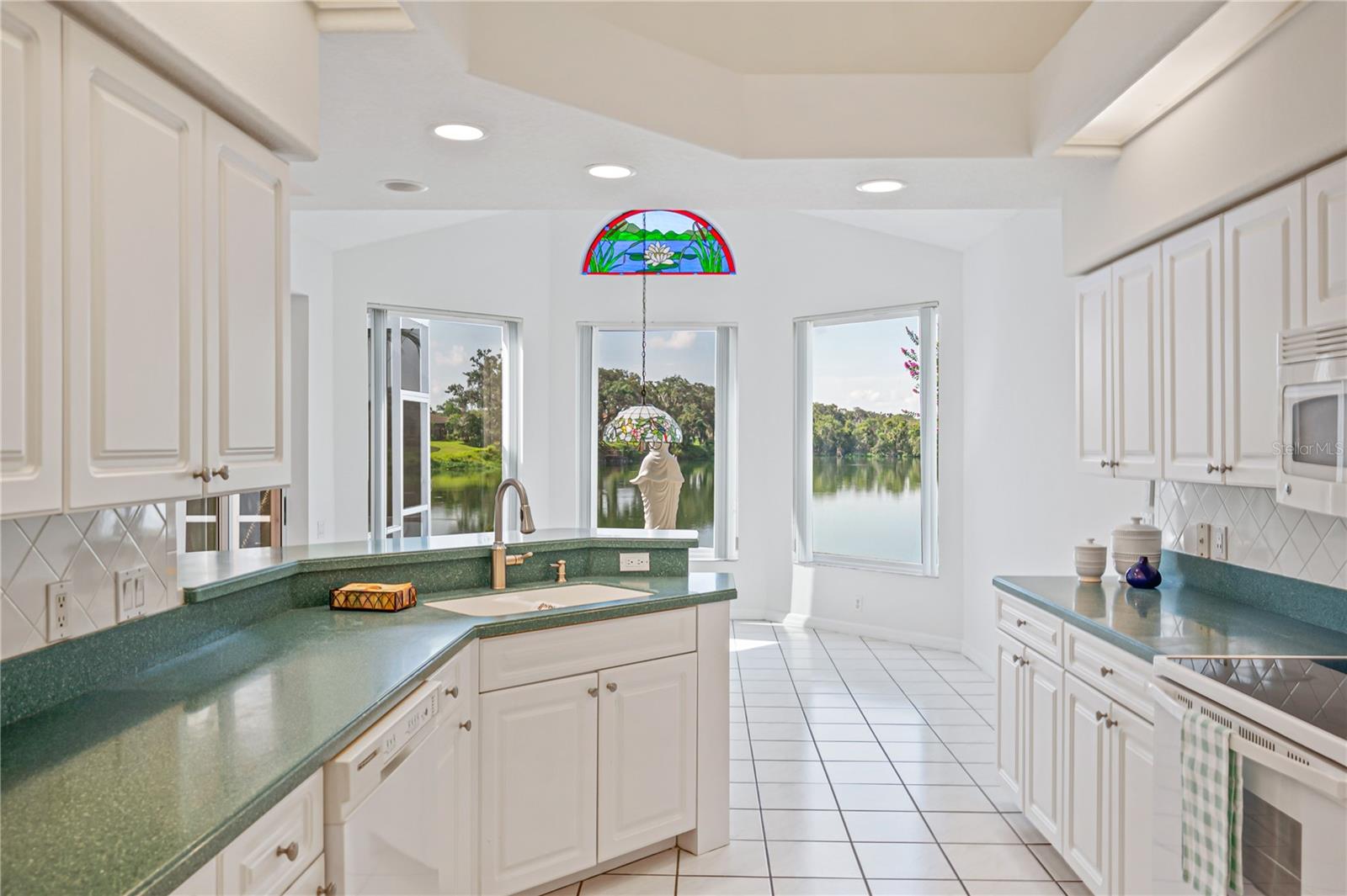 Kitchen also looks out to to the lake