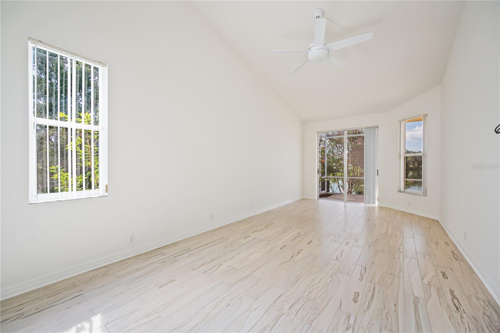 Master Bedroom has sliders to lanai and a window