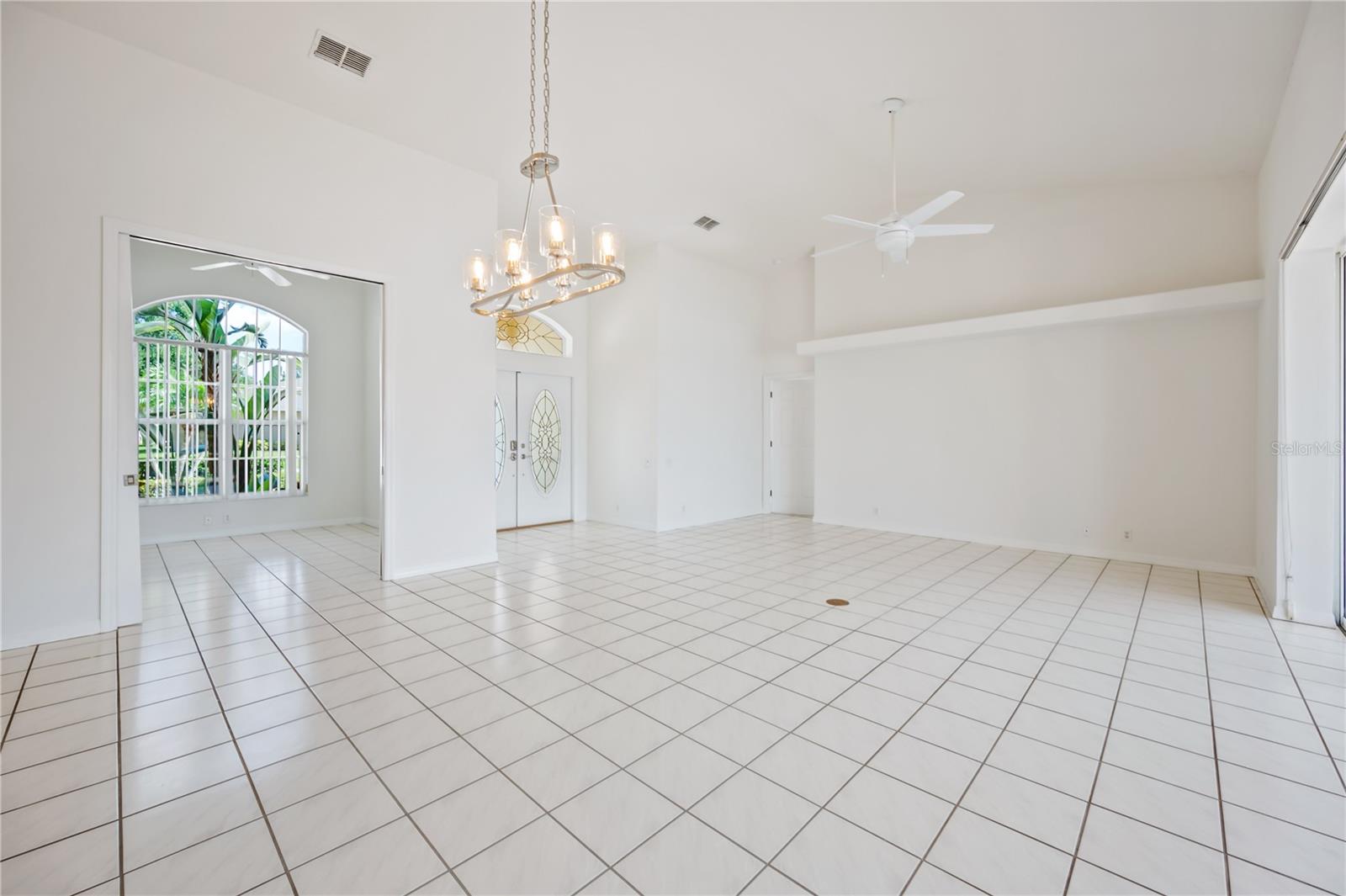 Living Room looking back to front entry