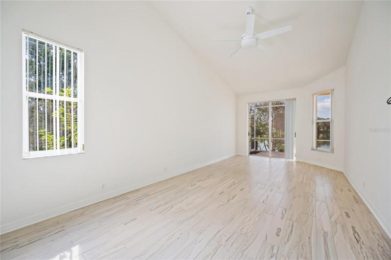 Master Bedroom has sliders to lanai and a window