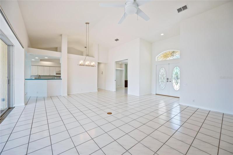 Living Room looking over to Dining Room and Kitchen beyond