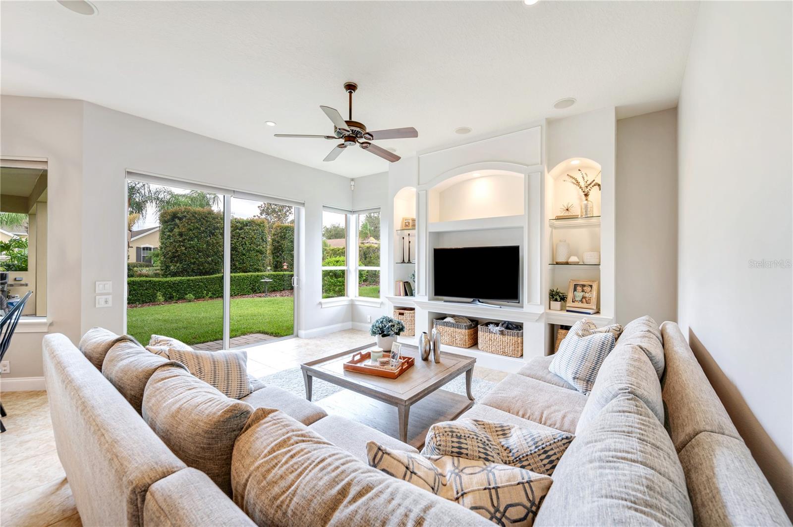 Sliding glass doors with views of the backyard