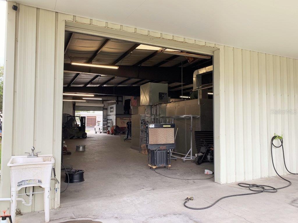 Looking from back carport area. 12 X 12 Garage doors in front and back