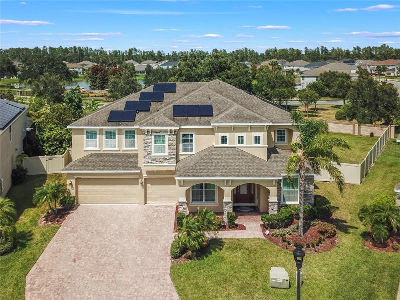 Gorgeous **POOL HOME** in the **GATED** Black Lake Preserve of Winter Garden with over 5,000 SqFt of formal, family and flex space, **DUAL PRIMARY SUITES** and energy cost saving **SOLAR PANELS** all on a large **.38 ACRE LOT!**
