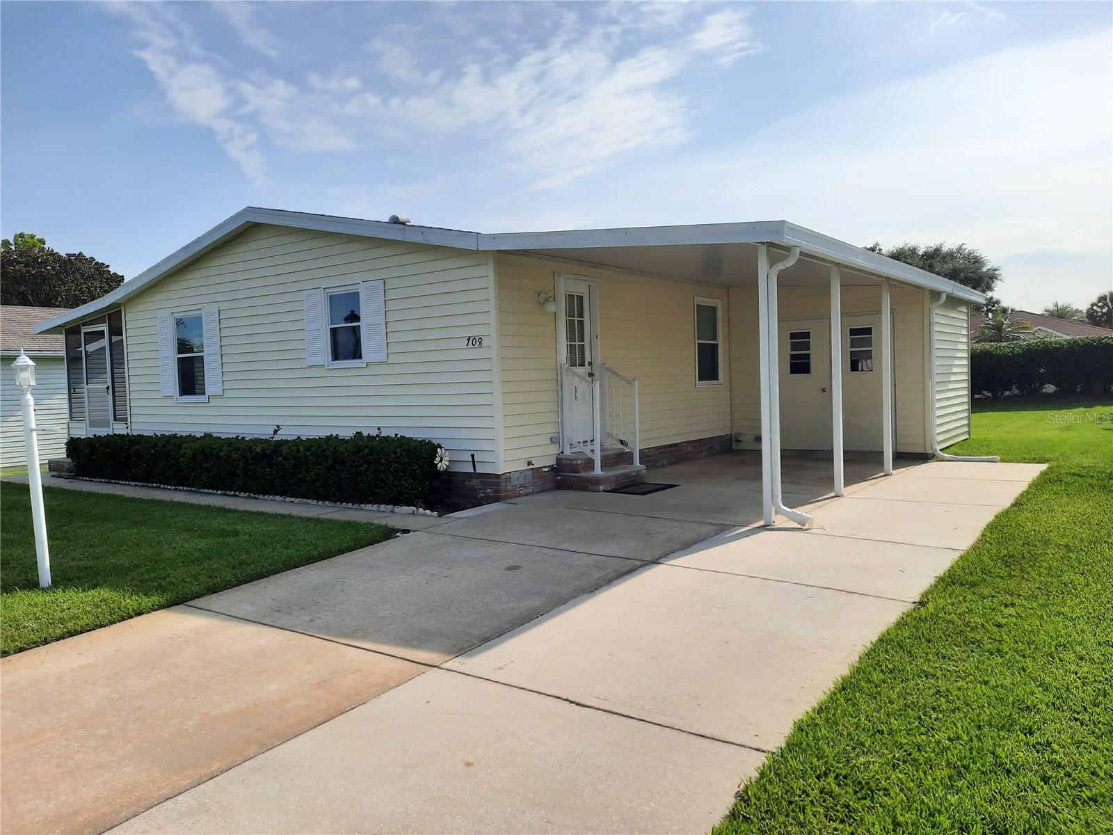 House front with carport