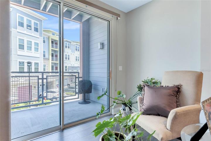 Sitting area opens up to the balcony!