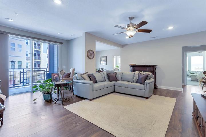 Your living area is spacious and open to an additional sitting area with oversized sliding glass doors to let the sun shine in that open up to a covered balcony!