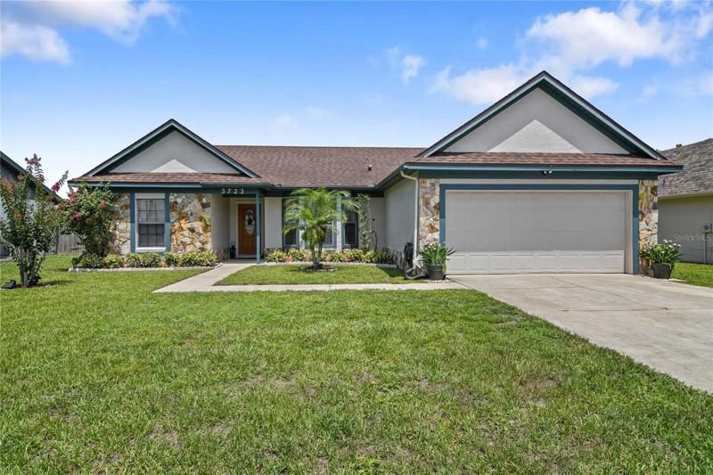 Front of home with fresh landscaping