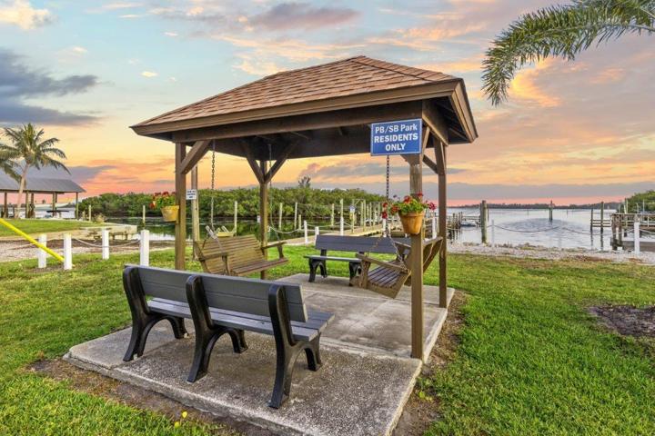 Community swings and benches located along the Sarasota bay