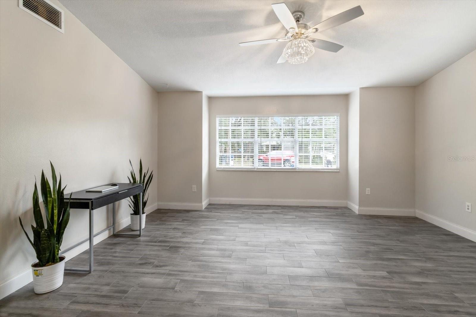 Living Room...Freshly Painted Interior &amp; Newer Tile Flooring