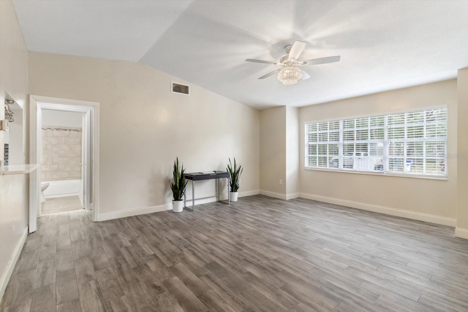 Living Room w/ Vaulted Ceiling
