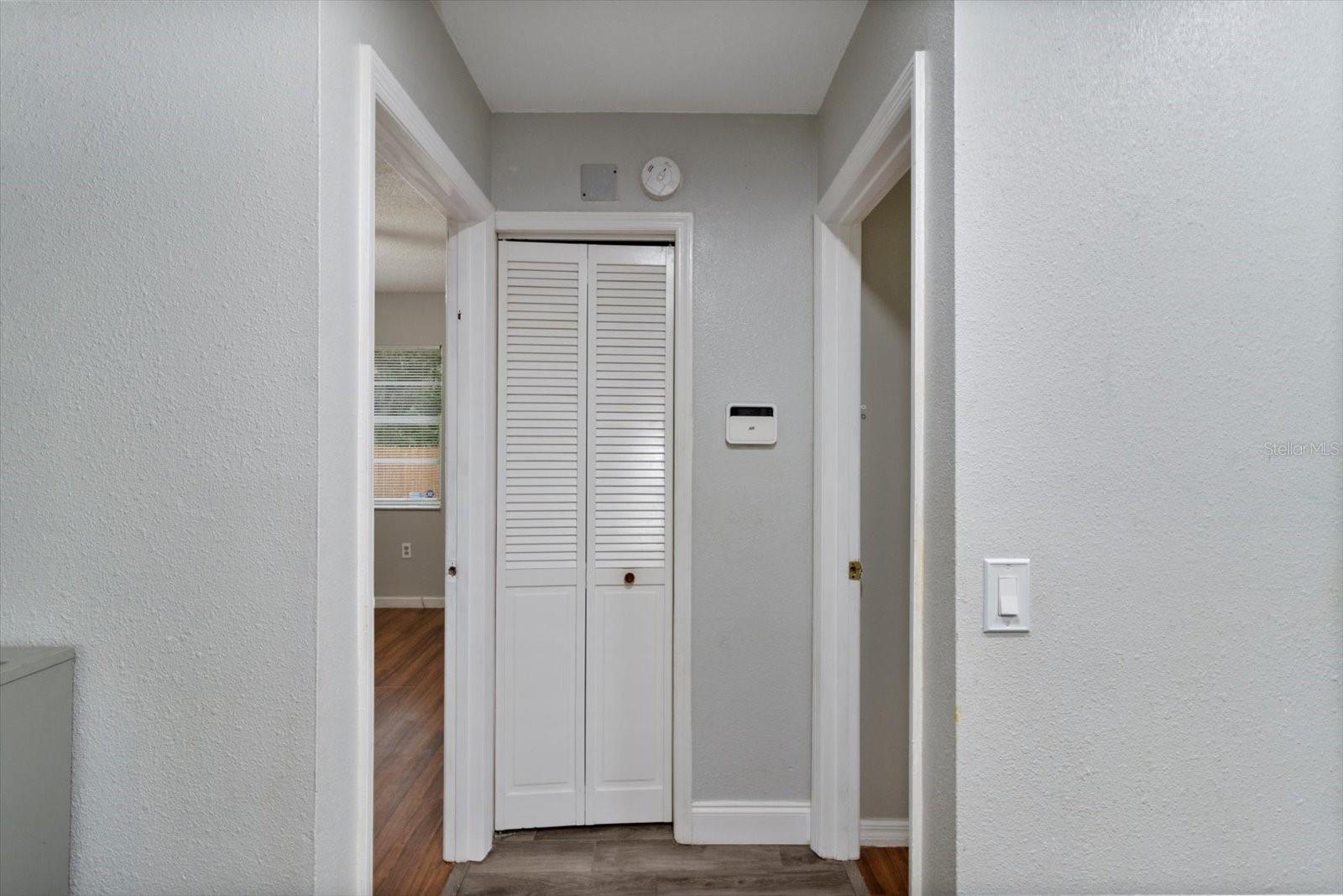 View from Dining Room into Hallway...Guest Bedroom 2 on Left and Master Bedroom on Right