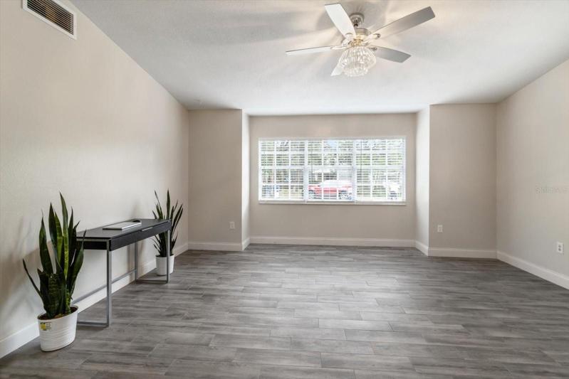 Living Room...Freshly Painted Interior &amp; Newer Tile Flooring