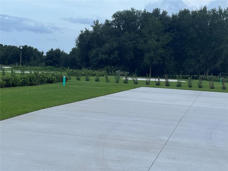 LOOKING FROM THE FRONT TO LEFT SIDE OF LOT