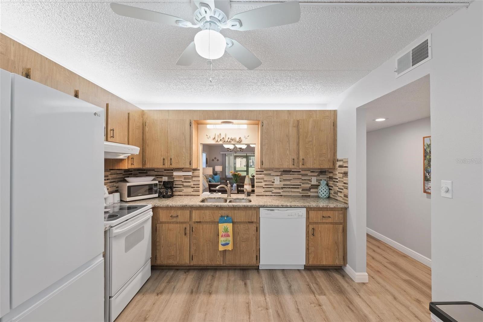 KITCHEN FROM EAT IN AREA