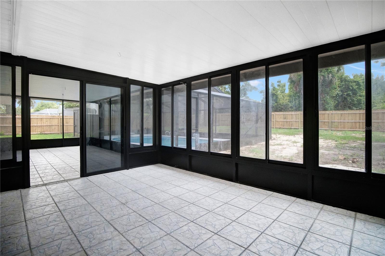 Enclosed portion of the back porch.