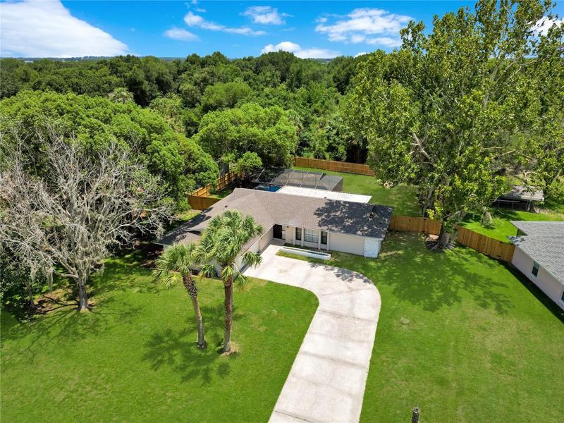 Welcome home to your 0.37 acre estate with an extended driveway and no rear neighbors.
