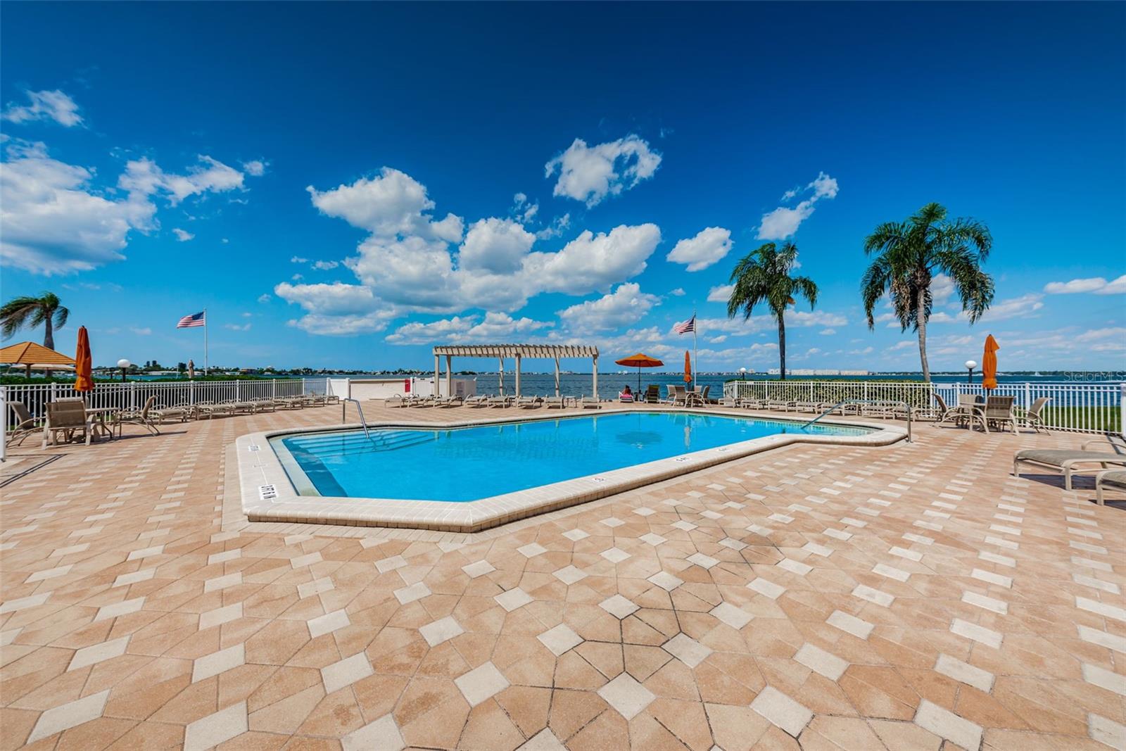 Pavered Gathering Area Surrounding Pool