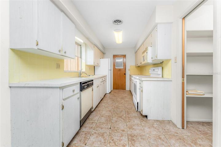 Large walk in pantry in the kitchen.