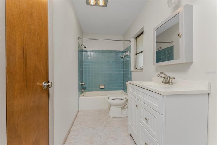 Master bath has an updated vanity/top and mirror!