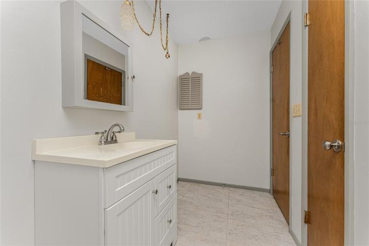 Another view of the master bath with linen closet.