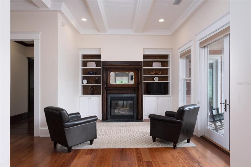 Downstairs owner's suite sitting room w/fireplace