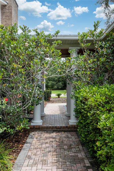 Charming breezeway between garage and home