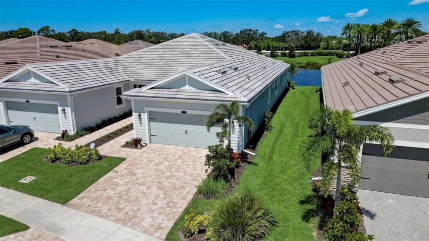 Villa for Sale in Sarasota FL - 2 Bedroom 2 Bath Plus Den 2 Car Garage Water Views – Sunrise Preserve at Palmer Ranch – Don’t Miss Out - Schedule a showing today!
