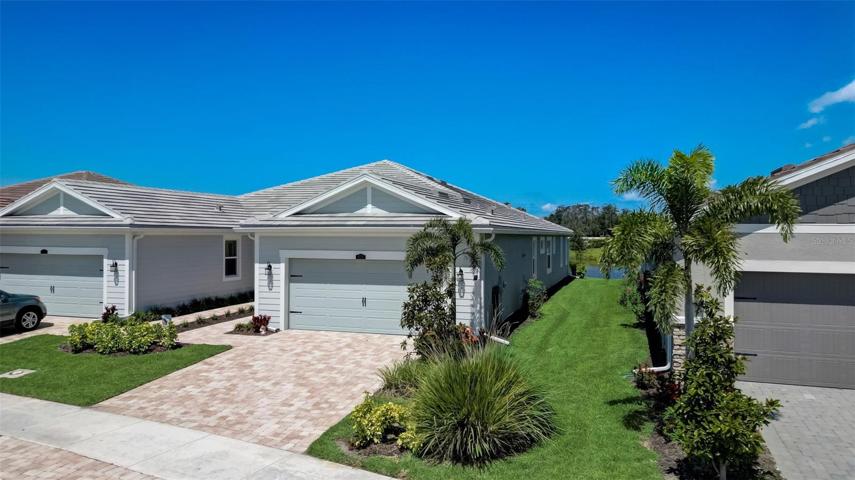 Villa for Sale in Sarasota FL - 2 Bedroom 2 Bath Plus Den 2 Car Garage Water Views – Sunrise Preserve at Palmer Ranch – Don’t Miss Out - Schedule a showing today!