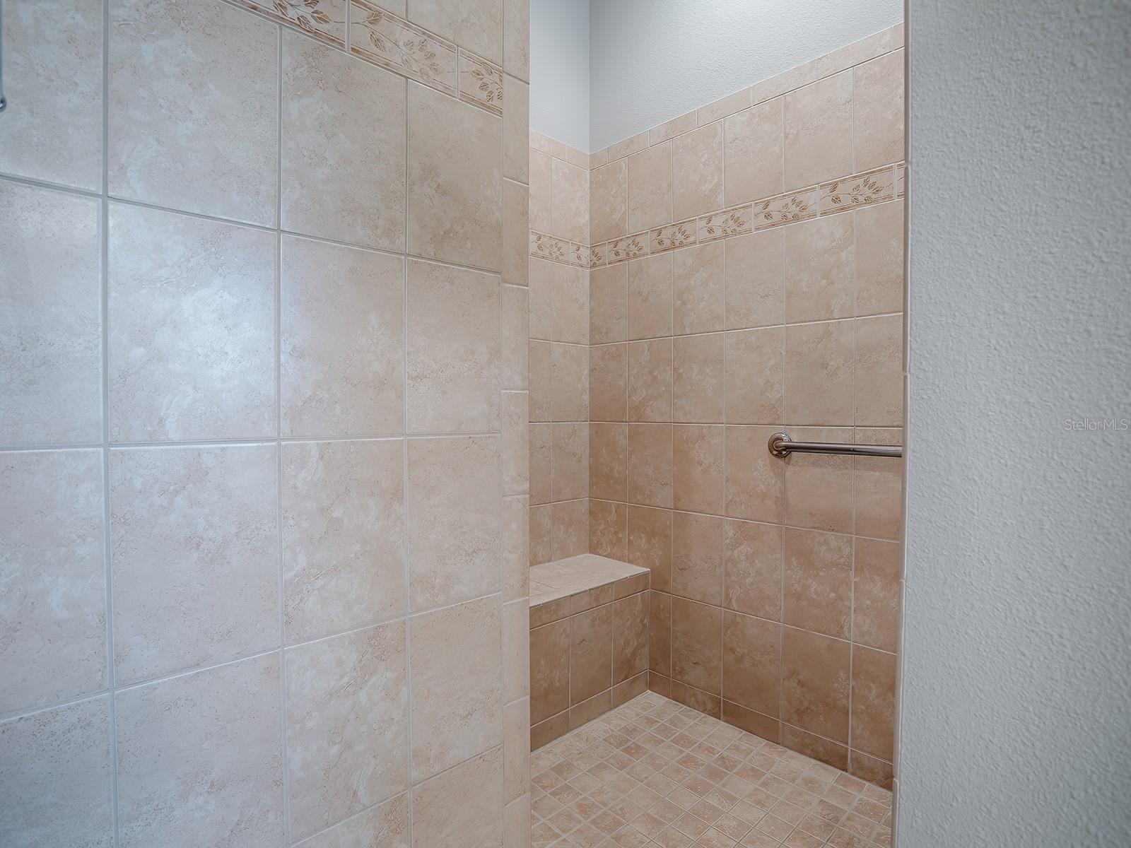 LOVELY TILED ROMAN SHOWER!