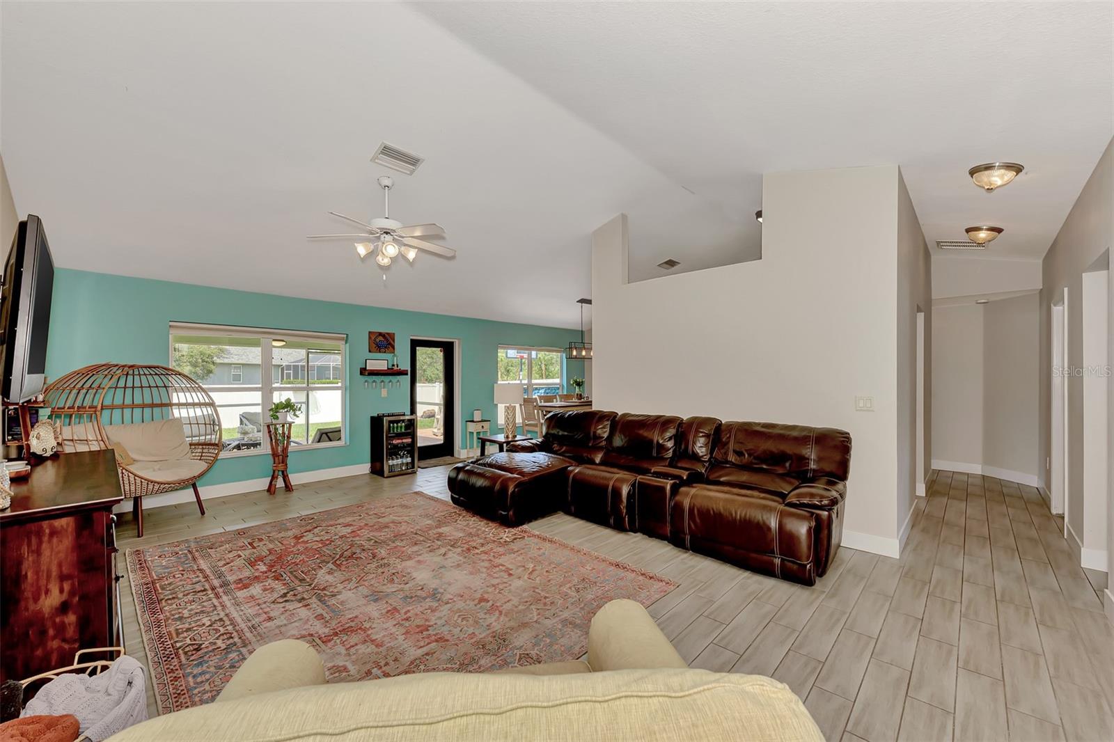 Living Room facing kitchen and breakfast nook
