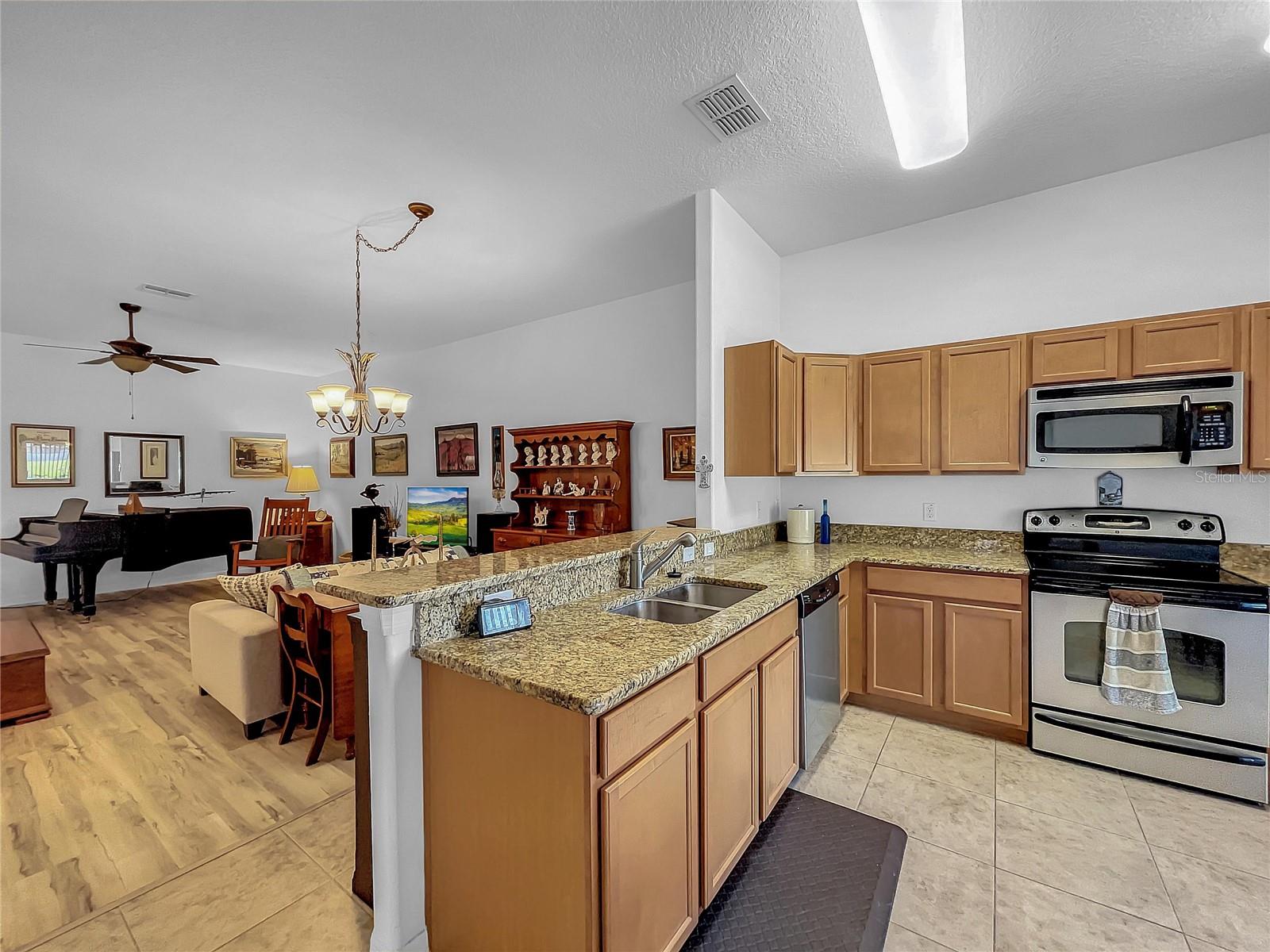 The kitchen is adjacent to the Living area