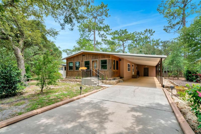 Exterior with extra long driveway and carport