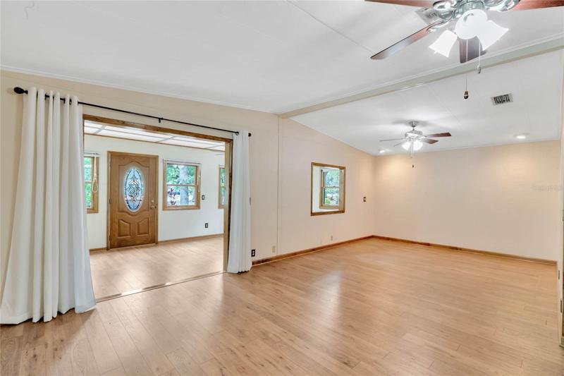 Living room with vaulted ceilings